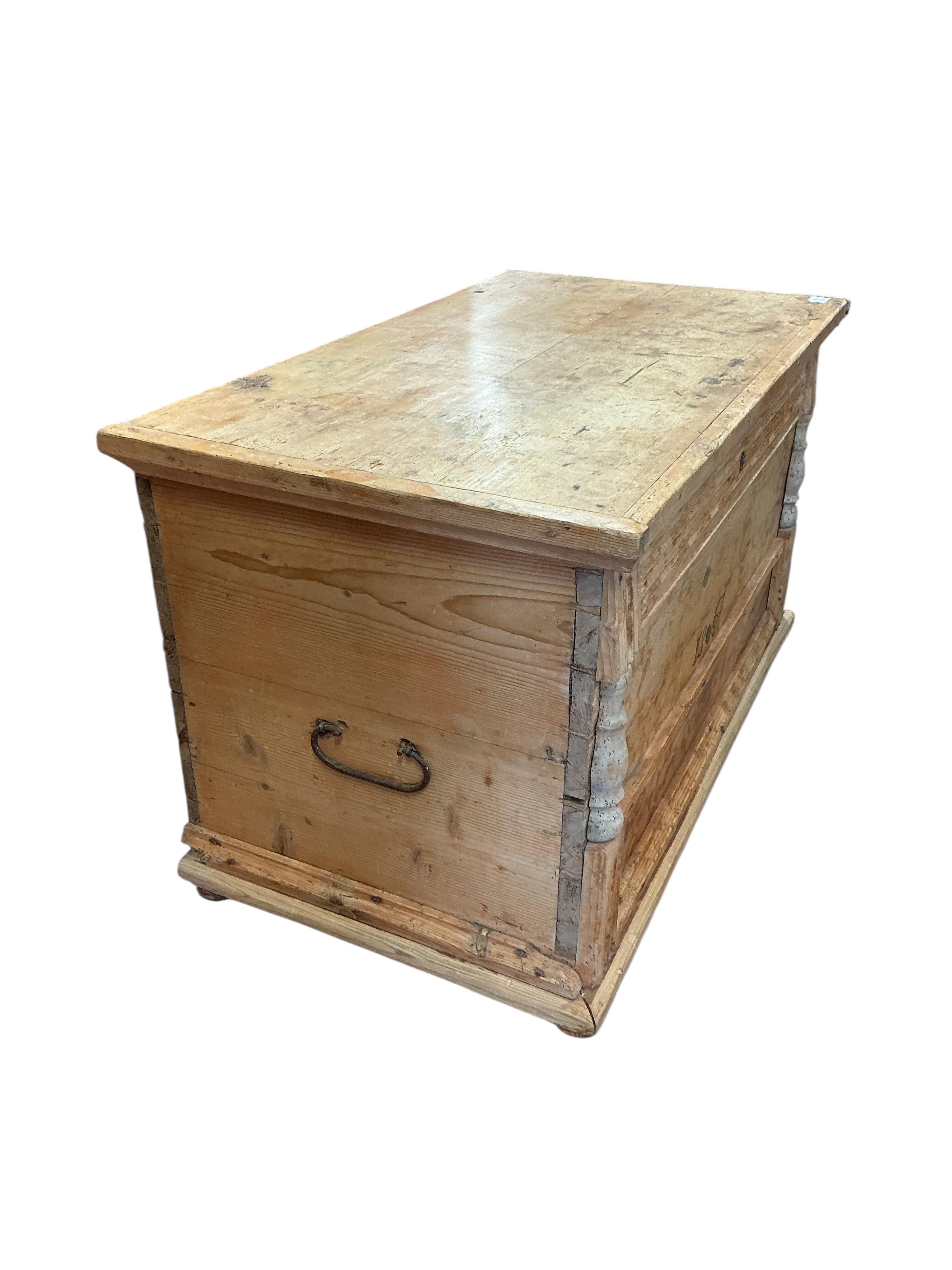 A 19th century Continental pine trunk, width 113cm, depth 64cm, height 65cm